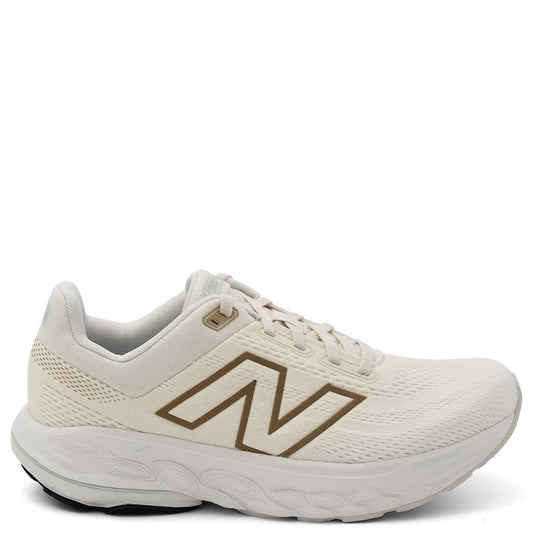 New Balance W860 V14 Women's Running Shoes  White running shoe with a brown logo 