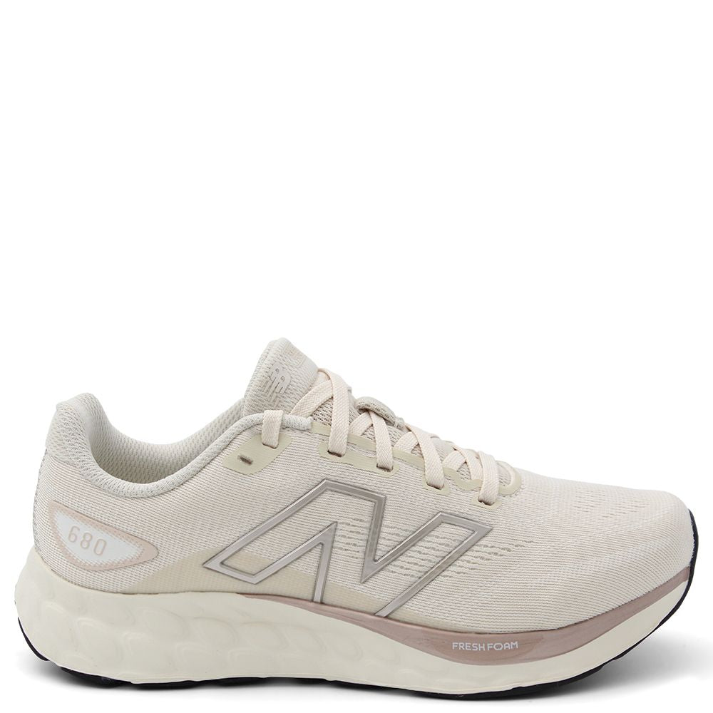 New Balance w680 V8 Women's Running Shoes Beige running shoe with New Balance logo 